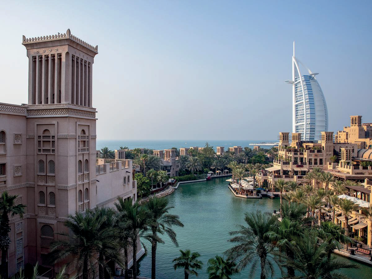 Madinat Jumeirah resort waterways and wind towers with the Burj Al Arab in the background